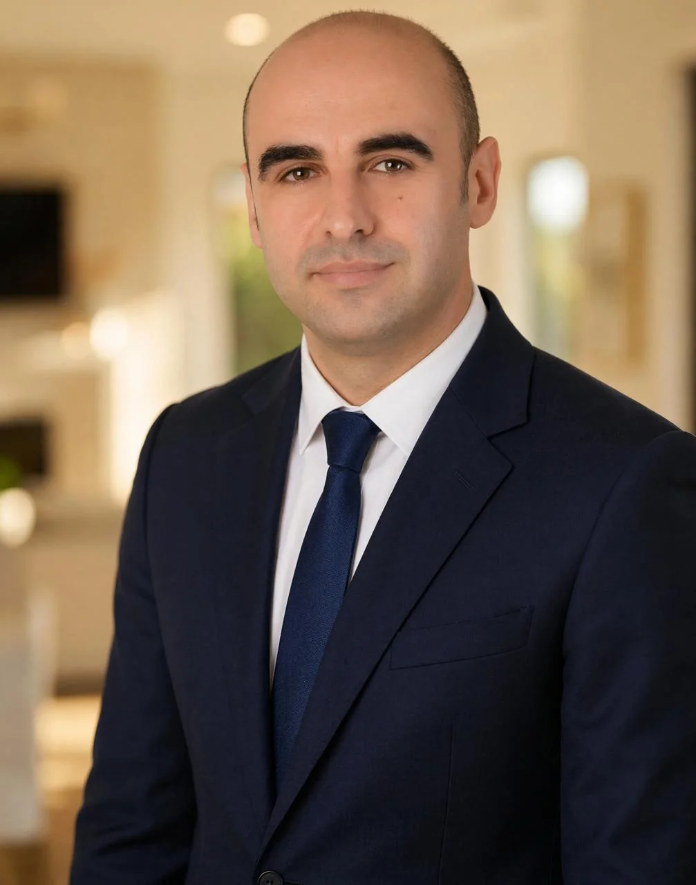 Özkan Özel — About Us